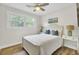Bright bedroom with a comfortable bed, and large windows, creating a peaceful and inviting atmosphere at 1515 Mulberry St, Charleston, SC 29407