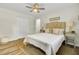 Comfortable bedroom with a cozy bed, ceiling fan, and closet perfect for relaxing at 1515 Mulberry St, Charleston, SC 29407
