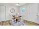 Cozy dining room features a round table, comfortable seating, and natural light at 1515 Mulberry St, Charleston, SC 29407