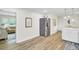 Open concept kitchen features stainless steel appliances and access to the living room at 1515 Mulberry St, Charleston, SC 29407