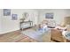 Bright living room with hardwood floors, neutral-toned furniture, and decor, offering a cozy and inviting atmosphere at 1515 Mulberry St, Charleston, SC 29407