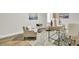 Beautifully decorated office space with stylish desk and seating area with natural light at 1515 Mulberry St, Charleston, SC 29407