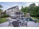 Home's stunning backyard pool with a fire pit and screened porch at 1566 Lindsey Creek Dr, Mount Pleasant, SC 29466