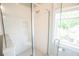 Bathroom showcasing a clear glass shower with white subway tile and brushed nickel fixtures at 1566 Lindsey Creek Dr, Mount Pleasant, SC 29466