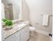 Bright bathroom with granite countertop, white cabinets, and neutral wall color at 1566 Lindsey Creek Dr, Mount Pleasant, SC 29466