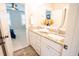Bathroom showcasing double sinks with granite countertops and white cabinets at 1566 Lindsey Creek Dr, Mount Pleasant, SC 29466