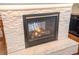Contemporary fireplace with white stone surround and a marble hearth at 1566 Lindsey Creek Dr, Mount Pleasant, SC 29466