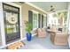Inviting front porch featuring comfortable seating and a welcoming entryway at 1566 Lindsey Creek Dr, Mount Pleasant, SC 29466