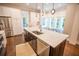 Bright kitchen showcasing a large island with stainless steel appliances at 1566 Lindsey Creek Dr, Mount Pleasant, SC 29466