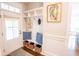 Functional mudroom with built-in storage, bench seating, and decorative pillows for added comfort at 1566 Lindsey Creek Dr, Mount Pleasant, SC 29466