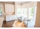 Bright and airy sitting area with large windows, comfortable chairs, and a hide rug at 1566 Lindsey Creek Dr, Mount Pleasant, SC 29466
