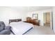 Bright bedroom features neutral carpet, ceiling fan, and furniture set at 1749 Towne St, Johns Island, SC 29455
