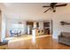 Inviting living area with hardwood flooring, a stainless steel kitchen, and ample natural light at 1749 Towne St, Johns Island, SC 29455