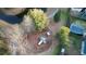 Aerial view of the neighborhood playground with a swing set, picnic tables, and a slide for community fun at 1749 Towne St, Johns Island, SC 29455
