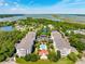 Beautiful aerial view of coastal condo community with pool and marsh views at 1984 Folly Rd # A310, Charleston, SC 29412