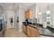 Well-equipped kitchen features stainless steel appliances and granite counters at 1984 Folly Rd # A310, Charleston, SC 29412