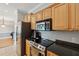 Modern kitchen featuring dark countertops and stainless steel appliances at 1984 Folly Rd # A310, Charleston, SC 29412