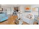 Cozy living room featuring hardwood floors and neutral coastal decor at 1984 Folly Rd # A310, Charleston, SC 29412