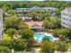 Overhead view of the community pool with lounge chairs and shade at 1984 Folly Rd # A310, Charleston, SC 29412