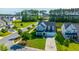 Aerial view of a blue home with a well-kept lawn in a suburban neighborhood at 201 Bigleaf Ct, Summerville, SC 29486