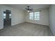 Bright bedroom featuring a window and ceiling fan at 201 Bigleaf Ct, Summerville, SC 29486