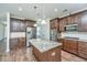 Kitchen featuring wood floors, a large island with granite countertops, and stainless steel appliances at 201 Bigleaf Ct, Summerville, SC 29486