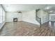 Large living room features hardwood floors, a fireplace and a staircase at 201 Bigleaf Ct, Summerville, SC 29486