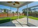 Covered and screened in back porch overlooking backyard and fence at 201 Bigleaf Ct, Summerville, SC 29486