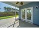 Covered and screened in back porch with access to the backyard at 201 Bigleaf Ct, Summerville, SC 29486