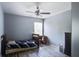 Bedroom featuring a ceiling fan, wood-look flooring, and natural light from the window at 2021 Asher Loop, Summerville, SC 29485