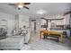 Inviting living room has hardwood floors and flows into an eat-in kitchen area at 2021 Asher Loop, Summerville, SC 29485