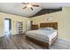 Large main bedroom offers hardwood floors, vaulted ceilings, great light and neutral walls at 2021 Asher Loop, Summerville, SC 29485