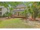 Large backyard featuring a spacious deck and lush landscaping for outdoor enjoyment at 2028 Prospect Hill Dr, Mount Pleasant, SC 29464