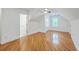 Spacious attic bedroom featuring wood floors, window with blinds, and closet at 2028 Prospect Hill Dr, Mount Pleasant, SC 29464