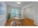 Dining room with hardwood floors, light walls, and wicker chairs around a table at 2028 Prospect Hill Dr, Mount Pleasant, SC 29464