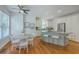 Eat in kitchen offers stainless appliances, a granite island with seating and ample light at 2028 Prospect Hill Dr, Mount Pleasant, SC 29464