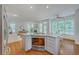 Open-concept kitchen featuring a granite island with oven and a view of the living area at 2028 Prospect Hill Dr, Mount Pleasant, SC 29464