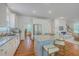Bright kitchen boasts granite countertops, stainless steel appliances, and a large island with seating at 2028 Prospect Hill Dr, Mount Pleasant, SC 29464