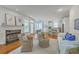Beautiful living area showcasing an open floor plan, fireplace, and updated kitchen at 2028 Prospect Hill Dr, Mount Pleasant, SC 29464