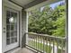 Private balcony with a view of lush greenery and a paved walkway, offering a serene outdoor space at 2064 Promenade Ct, Mount Pleasant, SC 29466