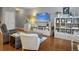 Cozy living room featuring hardwood floors, comfortable seating, and neutral decor at 2064 Promenade Ct, Mount Pleasant, SC 29466