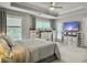 Spacious main bedroom features tray ceilings, a ceiling fan, natural light, and plenty of storage at 2064 Promenade Ct, Mount Pleasant, SC 29466