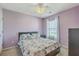 Bedroom with a ceiling fan, large window, and bright natural light at 210 Delafield Dr, Summerville, SC 29483