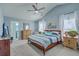 Bright bedroom with vaulted ceilings, complemented by a ceiling fan and natural light at 210 Delafield Dr, Summerville, SC 29483