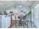 Updated dining area featuring modern lighting, slider doors, and stainless steel appliances at 210 Delafield Dr, Summerville, SC 29483