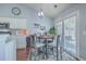 Dining area with a sliding glass door to the patio and views of the updated kitchen at 210 Delafield Dr, Summerville, SC 29483