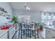 Dining area with natural light, stylish furniture, and a view of the patio at 210 Delafield Dr, Summerville, SC 29483