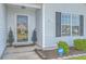 Inviting front entrance with decorative glass door and ADT security system at 210 Delafield Dr, Summerville, SC 29483