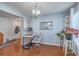 Bright home office featuring sleek desk, modern lighting, and ample natural light at 210 Delafield Dr, Summerville, SC 29483