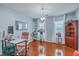 Well-lit home office with hardwood floors and ample space for work and decor at 210 Delafield Dr, Summerville, SC 29483